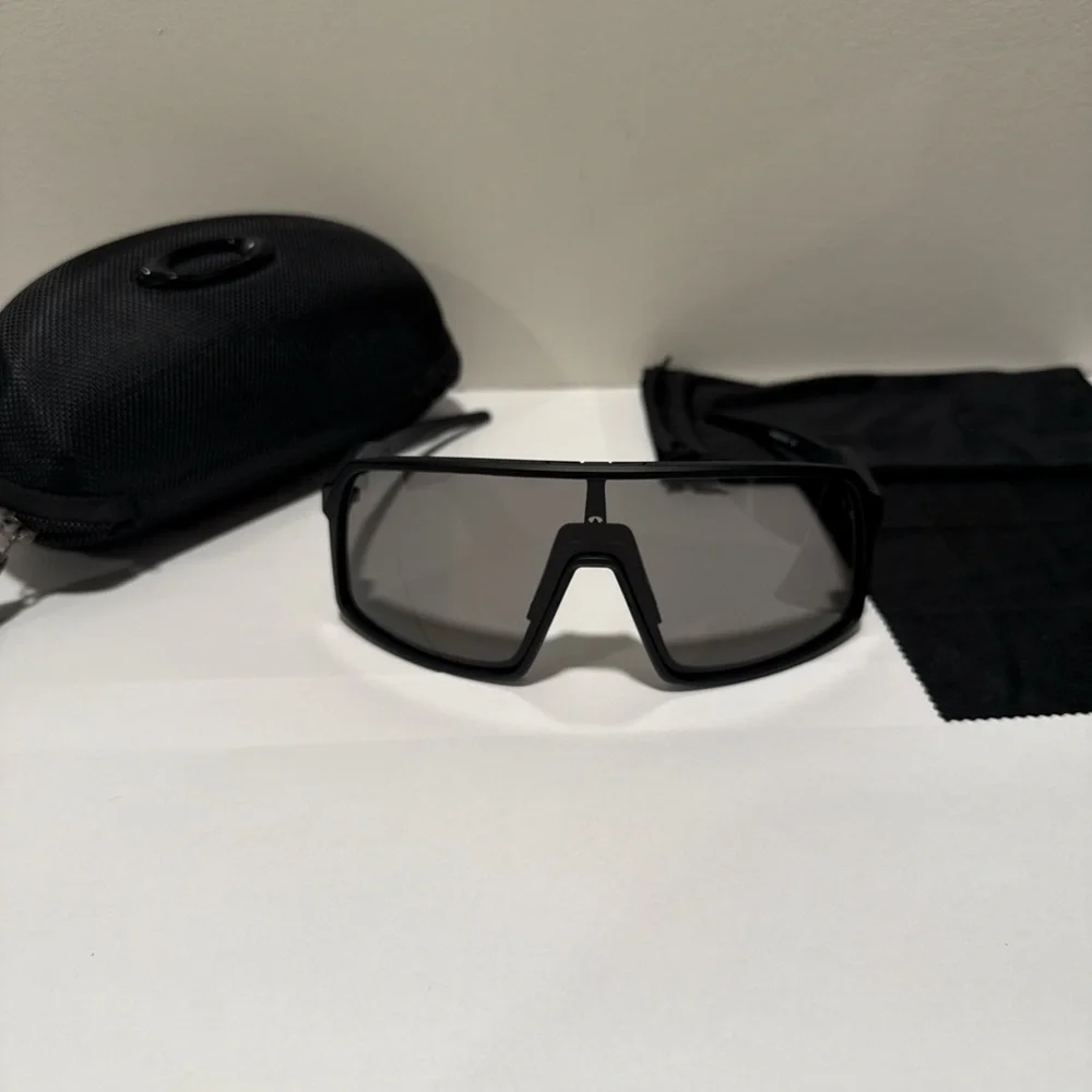 Oakley Black on Black Sutro sunglasses. Comes with case and bag
